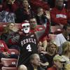 A UNLV fan wearing a Christmas mask dances during their NCAA basketball game against the Northern Colorado Bears Friday, December 22, 2017, at the Thomas & Mack Center. UNLV won the game 94-91 to move their record to 11-2.
