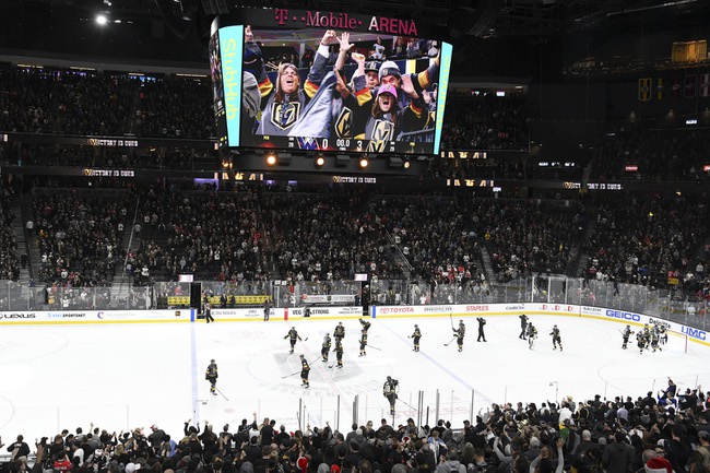 The Vegas Golden Knights celebrate their 3-0 shut out of the Washington Capitals in their NHL hockey game Saturday, December 23, 2017, at T-Mobile Arena in Las Vegas.