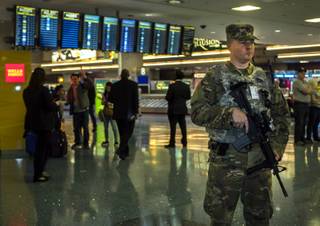 The Nevada Army National Guard's SSG Kris Hayman begins patrolling at McCarran International Airport with hundreds of others in the 72nd MP group to supplement local law enforcement agencies during the New Year's holiday period on Friday, Dec. 29, 2017.