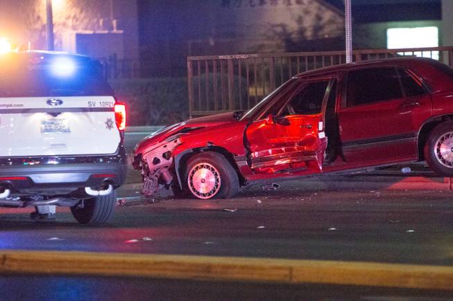 A damaged car near Valley View Boulevard and Spring Mountain after a couple, riding in two cars, continued a domestic dispute, crashing into other vehicles, Dec. 29, 2017. 
