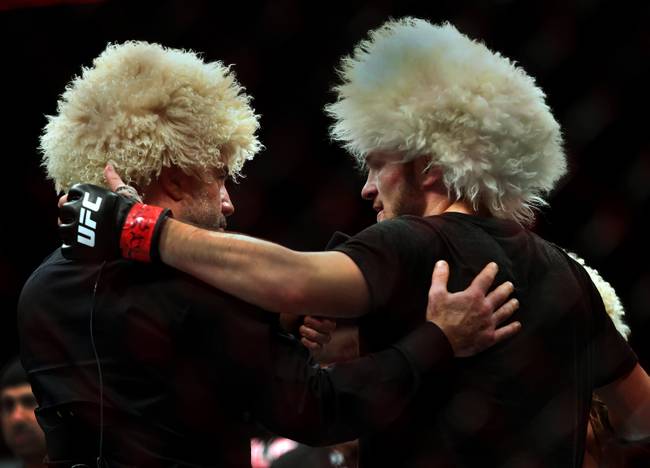 Commentator Joe Rogan interviews lightweight Khabib Nurmagomedov after defeating Edson Barboza in their UFC219 fight at the T-Mobile Arena on Saturday, Dec. 30, 2017.