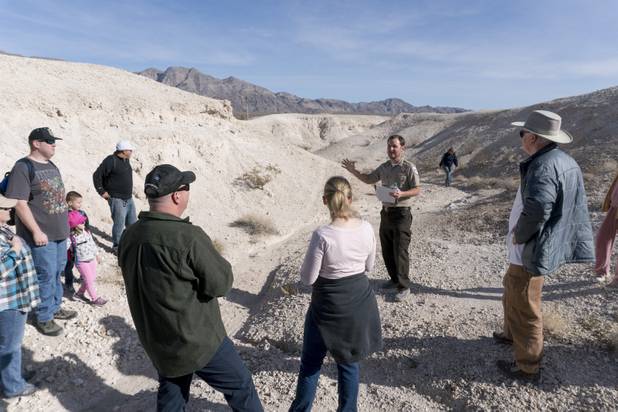 Park Ranger Garrett Fehner talks about the Las Vegas Wash part of which is located inside Ice Age Fossils State ParkLas Vegas' newest state park where visitors can explore and learn about fossil beds located in the areaduring a ranger-guided hike, Monday, Jan. 1, 2018. With the park still in development, a visitor's center, interpretive trails and more infographic signs are expected to complete the park within two years.