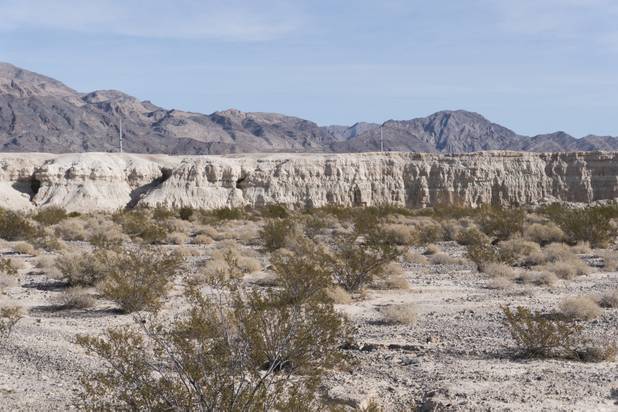 Exposed sedimentary rock layers that have been formed over thousands of years are pointed out during a ranger-guided hike through Ice Age Fossils State ParkLas Vegas' newest state park where visitors can explore and learn about fossil beds located in the area, Monday, Jan. 1, 2018. With the park still in developmenta visitor's center, interpretive trails and more infographic signs are expected to complete the park within two years.