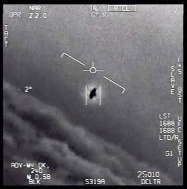 In an undated handout image taken from a video released by the Defense Department's Advanced Aerospace Threat Identification Program, a 2004 encounter near San Diego between two Navy F/A-18F fighter jets and an unknown object. UFOs have been repeatedly investigated over the decades in the United States, including by the American military.