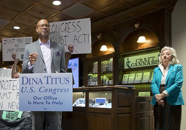 Nevada Senate Majority Leader Aaron Ford speaks as Congresswoman Dina Titus (D-Nev) stands by at right during a news conference at the Apothecary Shoppe marijuana dispensary on West Flamingo Road Thursday, Jan. 04, 2018. Ford is also a candidate for state attorney general.