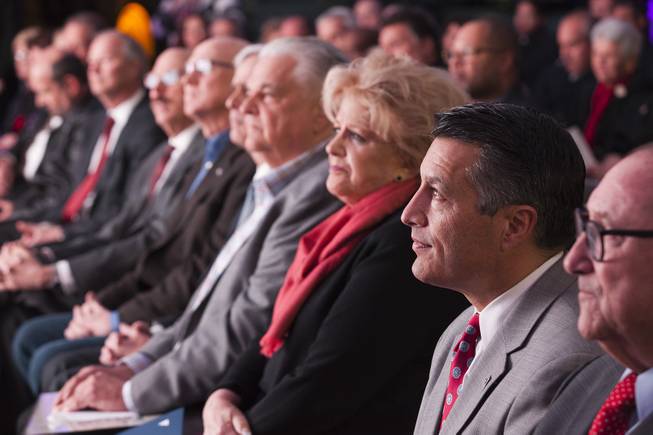 Gov. Brian Sandoval, second from right, looks on as Gary Shapiro, president and CEO of Consumer Technology Association, addresses the audience during the Las Vegas Convention Center Phase Two expansion groundbreaking ceremony on the Las Vegas Strip, Monday, Jan. 8, 2018.