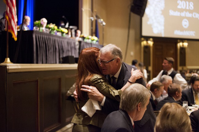 Henderson Mayor Debra March hugs former Henderson Mayor Andy Hafen ...