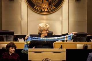 Las Vegas Mayor Carolyn Goodman holds up a Las Vegas Lights pro soccer team scarf while giving a shout out to Las Vegas Lights FC owner Brett Lashbrook during her 2018 State of the City address at City Hall downtown, Thursday, Jan. 11, 2018.