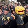 The Vegas Golden Knights mascot Chance the Golden Gila Monster poses with fans during a Vegas Golden Knights Fan Fest at the Fremont Street Experience in downtown Las Vegas Sunday, Jan. 14, 2018.