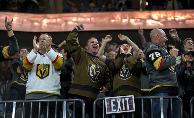 Vegas Golden Knights fans celebrate center William Karlsson's (71) goal over the Edmonton Oilers during their game at the T-Mobile Arena on Saturday, Jan. 13, 2018.  L.E. Baskow