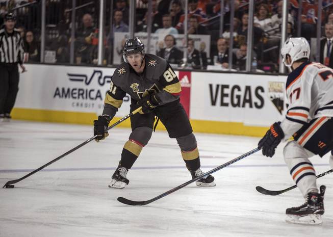 Vegas Golden Knights center Jonathan Marchessault (81) readies for a shot past Edmonton Oilers defenseman Oscar Klefbom (77) during their game at the T-Mobile Arena on Saturday, Jan. 13, 2018.  L.E. Baskow