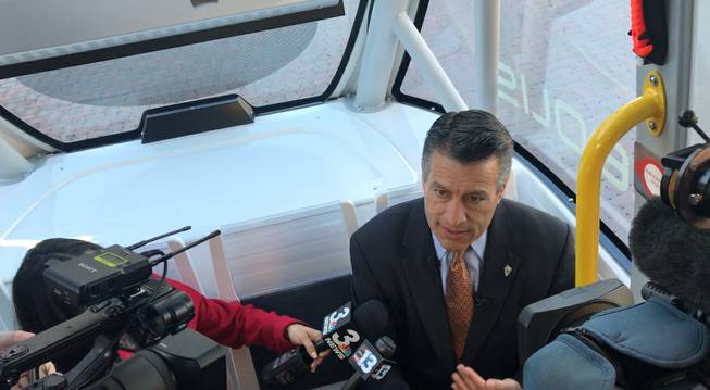 Gov. Brian Sandoval speaks with members of the media about Nevada being on the forefront of testing of self-driving vehicles, while traveling in an autonomous shuttle at the Hilton Lake Las Vegas in Henderson on  Friday, Jan. 12, 2018.