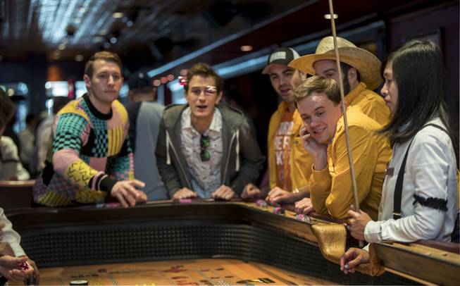 Players enjoy a craps game during the Golden Gate's 112th year anniversary celebration on Saturday, Jan. 13, 2018.