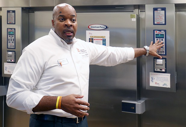Maurice Johnson, director of operations at Three Square, shows off a blast chiller during a tour at the Three Square kitchen Wednesday, Jan. 17, 2018. MGM Resorts International announced a surplus banquet food donation program they hope will provide 800,0000 meals by 2020.