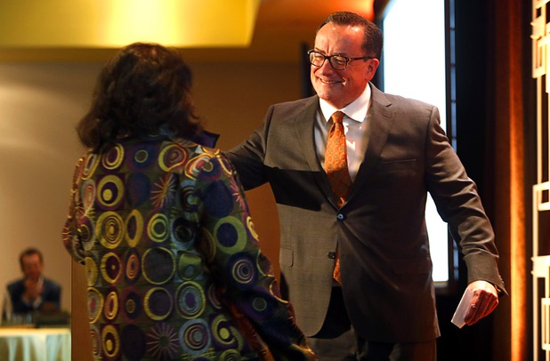 Brian Burton, right, president/CEO of Three Square, welcomes Phyllis A. James, executive vice president and chief corporate social responsibility officer for MGM Resorts International, during a news conference at the Three Square food bank Wednesday, Jan. 17, 2018. MGM Resorts International announced a surplus banquet food donation program they hope will provide 800,0000 meals by 2020.