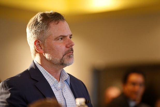 Jim Murren, chairman/CEO of MGM Resorts International, attends a news conference at the Three Square food bank Wednesday, Jan. 17, 2018. MGM Resorts announced a surplus banquet food donation program they hope will provide 800,0000 meals by 2020.