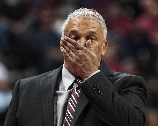 UNLV Rebels head coach Marvin Menzies is frustrated on the bench by bad calls and play versus the New Mexico Lobos during their game at the Thomas & Mack Center on Wednesday, Jan. 17, 2018.