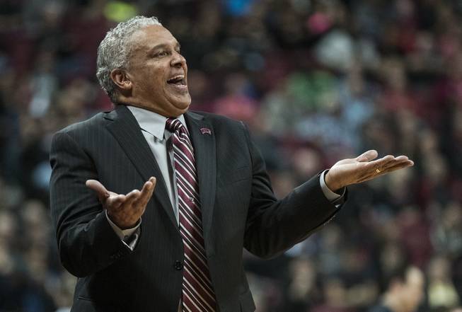 UNLV Rebels head coach Marvin Menzies questions another foul call versus the New Mexico Lobos during their game at the Thomas & Mack Center on Wednesday, Jan. 17, 2018.