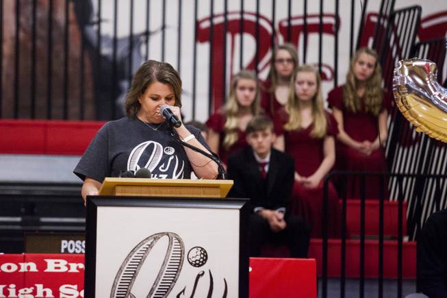 Merridee Robbins Turner, aunt of Quinton Robbins an Oct. 1 shooting victim, gets emotional while talking about Robbins during a Clark County School District tribute ceremony at B. Mahlon Brown Academy of International Studies, Wednesday, Jan. 17, 2018.  An active participant of school sports, Robbins' #3 jersey was retired during the ceremony.