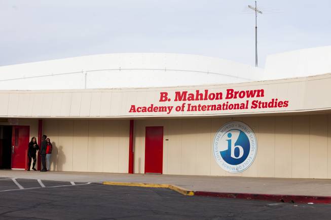 Students stand outside B. Mahlon Brown Academy of International Studies during a Clark County School District tribute ceremony at B. Mahlon Brown Academy of International Studies for Quinton Robbins, an Oct. 1 shooting victim who is an alumni of B. Mahlon Brown Academy of International Studies and Basic Academy of International Studies, Wednesday, Jan. 17, 2018.  An active participant of school sports, Robbins' #3 jersey was retired during the ceremony.