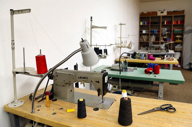 Industrial sewing machines are shown at Behind the Seams, a ...