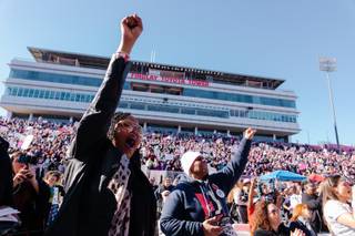 Attendees react to a speech by Melissa Harris Perry during the Women's March: Power to the Polls at Sam Boyd Stadium, Sunday, Jan. 21, 2018.