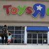 In this Sept. 19, 2017, file photo, shoppers walk into a Toys R Us store, in San Antonio, Texas.