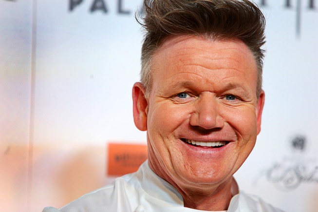 Celebrity chef Gordon Ramsay smiles on the red carpet during ...