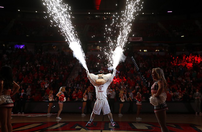 Sparks fly from the gloves of UNLV mascot Hey Reb ...