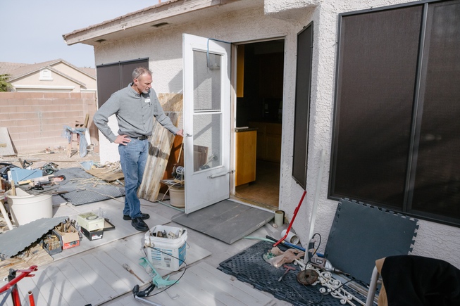 Jason Matthes, project manager at Rebuilding Together Southern Nevada, shows ...