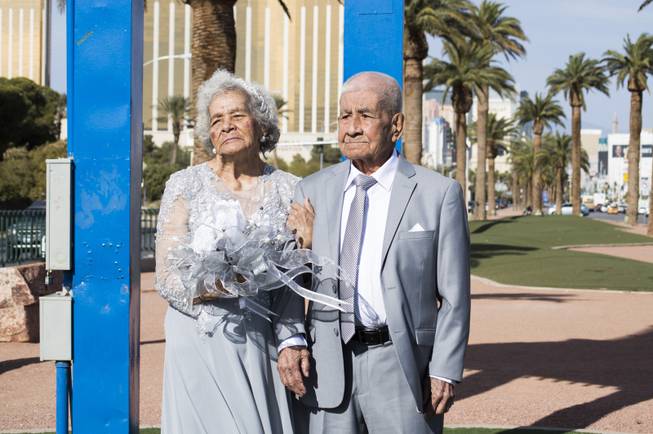 Onesino and Lucina Ramirez stand at the Welcome to Fabulous Las Vegas Sign on Friday, January 19, 2018. Onesino, 99, and Lucina, 91, will celebrate both their 75th anniversary and Onesinos 100th birthday this month.