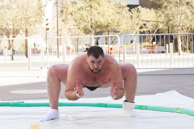 Professional Sumo wrestler Soslan Gagloev demonstrates a flexibility and strength ...
