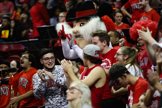 Hey Reb! and fans cheer on the UNLV Rebels during ...