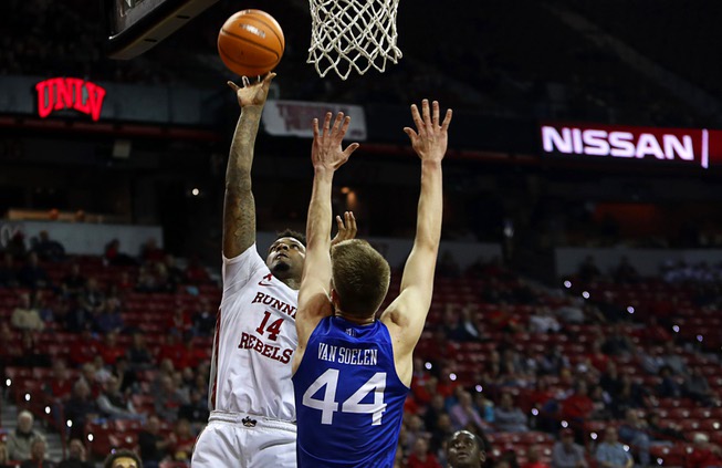 UNLV Rebels forward Tervell Beck (14) takes a shot over ...