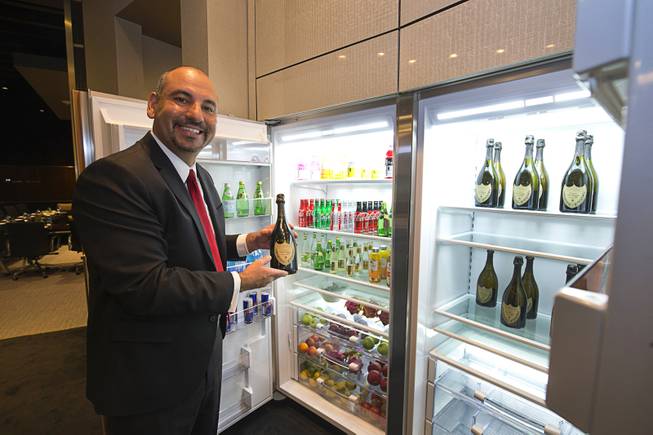 Tony Yousfi, vice president of sales at Aria and Vdara, shows off some drinks in the Cypress Executive Lounge, part of the new Aria East Convention Center Thursday, Feb. 15, 2018. The new $170 million addition adds 200,000 sq. ft. of convention space.