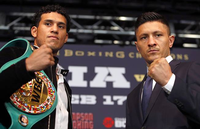 WBC super middleweight champion David Benavidez, left, of Phoenix, Ariz. poses with Ronald Gavril of Las Vegas during a news conference at the Mandalay Bay Thursday, Feb. 15, 2018. The boxers will fight in a rematch at the Mandalay Bay Events Center Saturday.