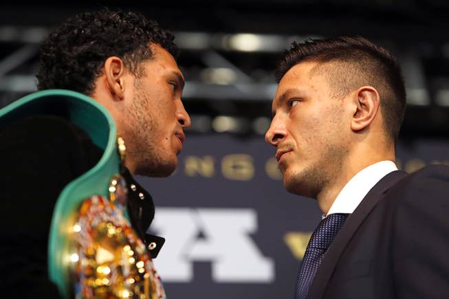 WBC super middleweight champion David Benavidez, left, of Phoenix, Ariz. and Ronald Gavril of Las Vegas face off during a news conference at the Mandalay Bay Thursday, Feb. 15, 2018. The boxers will fight in a rematch at the Mandalay Bay Events Center Saturday.
