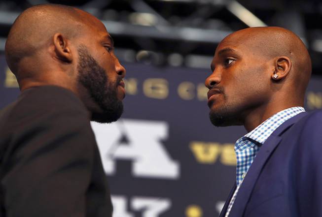 Yordenis Ugas, left, of Cuba, and Ray Robinson of Philadelphia face off during a news conference at the Mandalay Bay Thursday, Feb. 15, 2018. The welterweight boxers will meet for a 12-round bout at the Mandalay Bay Events Center Saturday.