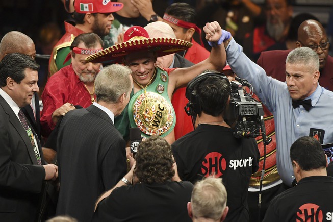 David Benavidez celebrates his victory over Ronald Gavril after their ...