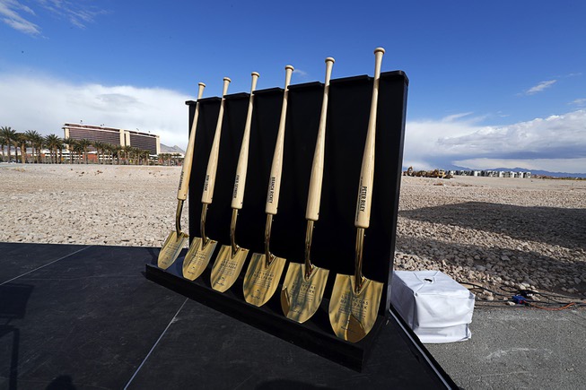 Commemorative shovels with baseball bat handles are displayed during a ...