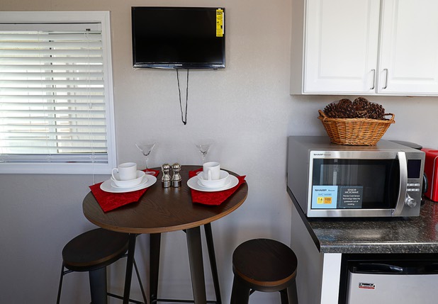 A dining area is shown in a tiny home, made from a shipping container, at Veterans Village 2 near downtown Las Vegas Saturday, Feb. 24, 2018.