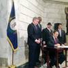 Kentucky Gov. Matt Bevin signs an executive order aimed at giving people with criminal records a "fair chance" to land state government jobs, at the state Capitol in Frankfort, Ky., Wednesday, Feb. 1, 2017. The Republican governor's action will remove the box on state job application forms that asks job seekers whether they have criminal records.