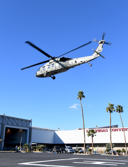 Helicopters depart the Las Vegas Convention Center after the end ...