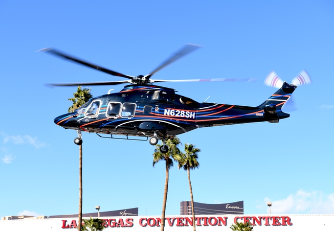Helicopters depart the Las Vegas Convention Center after the end ...