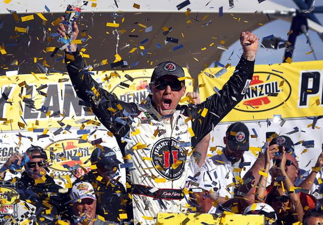 Kevin Harvick (4) celebrates in victory lane after winning the NASCAR Pennzoil 400 race at the Las Vegas Motor Speedway Sunday March 4, 2018.