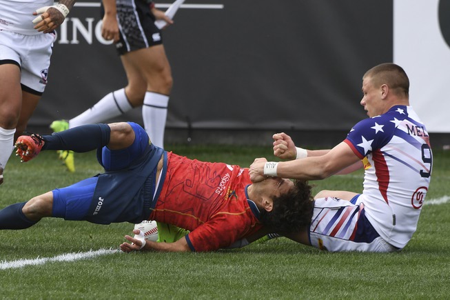 Cody Melphy of the United States inadvertently grabs the face ...