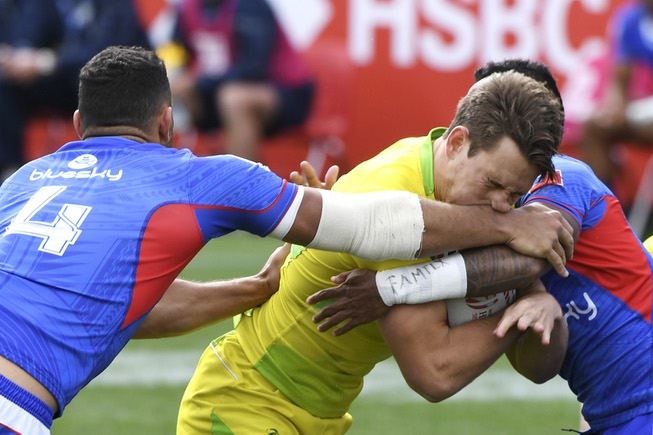 Lachie Anderson of Australia runs into the arms of Jacob ...