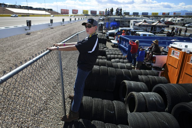 NASCAR Fans - A young fan watches the action from the infield during ... -