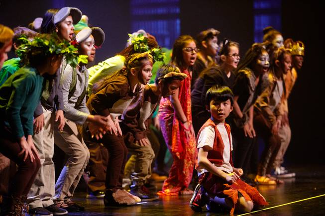 Students from Dr. C. Owen Roundy Elementary performs a scene ...
