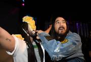Steve Aoki celebrates the unveiling of his own wax figure at Madame Tussauds during the DJ Experience Launch party, Tuesday, March 6, 2018.